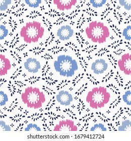Seamless abstract ikat pattern with the image of floral ornament.
