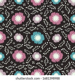Seamless abstract ikat pattern with the image of floral ornament.
