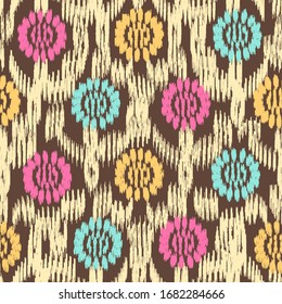 Seamless abstract ikat pattern with the image of floral ornament.
