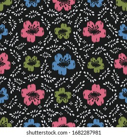 Seamless abstract ikat pattern with the image of floral ornament.
