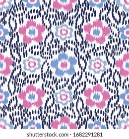 Seamless abstract ikat pattern with the image of floral ornament.
