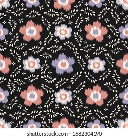 Seamless abstract ikat pattern with the image of floral ornament.
