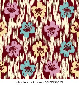 Seamless abstract ikat pattern with the image of floral ornament.
