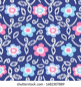 Seamless abstract ikat pattern with the image of floral ornament.
