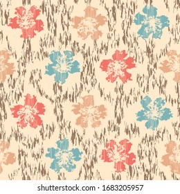 Seamless abstract ikat pattern with the image of floral ornament.
