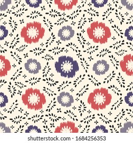Seamless abstract ikat pattern with the image of floral ornament.
