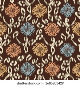 Seamless abstract ikat pattern with the image of floral ornament.
