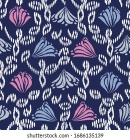 Seamless abstract ikat pattern with the image of floral ornament.
