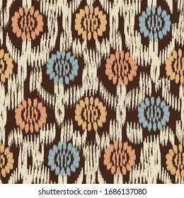 Seamless abstract ikat pattern with the image of floral ornament.

