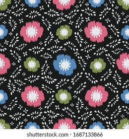 Seamless abstract ikat pattern with the image of floral ornament.
