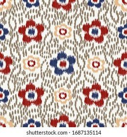 Seamless abstract ikat pattern with the image of floral ornament.
