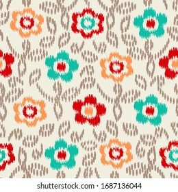 Seamless abstract ikat pattern with the image of floral ornament.
