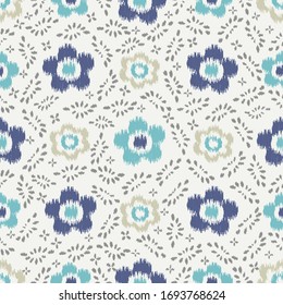 Seamless abstract ikat pattern with the image of floral ornament.
