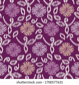 Seamless abstract ikat pattern with the image of floral ornament.
