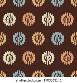 Seamless abstract ikat pattern with the image of floral ornament.
