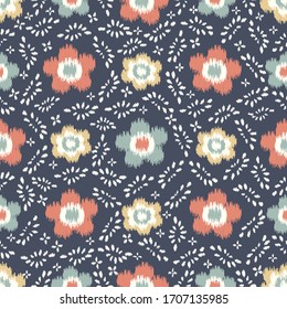 Seamless abstract ikat pattern with the image of floral ornament.
