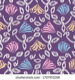 Seamless abstract ikat pattern with the image of floral ornament.
