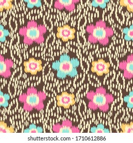 Patrón abstracto de ikat sin inconvenientes con la imagen de adorno floral.
