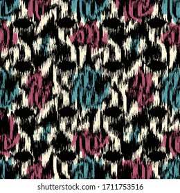Seamless abstract ikat pattern with the image of floral ornament.
