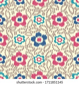 Seamless abstract ikat pattern with the image of floral ornament.
