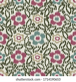 Seamless abstract ikat pattern with the image of floral ornament.
