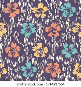 Seamless abstract ikat pattern with the image of floral ornament.
