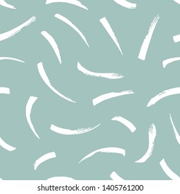 Seamless abstract marks pattern with handmade brushstroke elements.