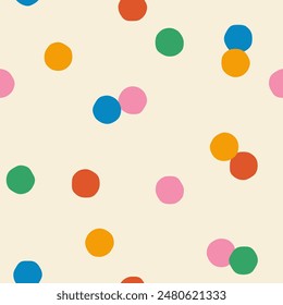 Seamless abstract multicolored polka dot pattern on a light background, hand drawn illustration 