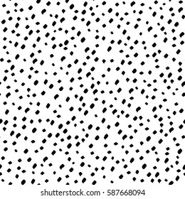 Seamless abstract painted ink pattern. Vector. Rare strokes of a brush. Black and white hand-drawn pattern. The ink dots. The texture of the wrapper or background.
