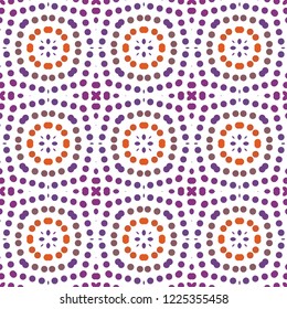 Seamless abstract pattern background with a variety of colored circles.
