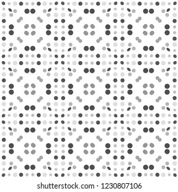 Seamless abstract pattern background with a variety of grey circles.