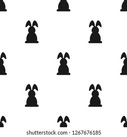 Seamless abstract pattern with black  Easter rabbits on white background. Decorative holiday wallpaper, good for printing. Cute Vector illustration. Flat design