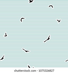 Seamless abstract pattern with black flying  birds on blue stripes. white background. Vector illustration.  