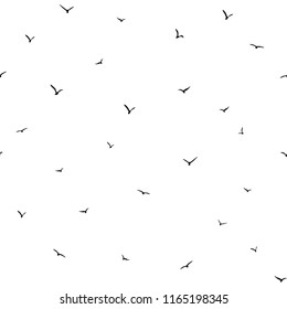 Seamless abstract pattern with black flying birds on white background. Decorative wallpaper, good for printing and fabric. Vector illustration.