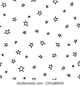 Seamless abstract pattern with black hand drawn shabby stars on white background. Vector illustration black and white. Cosmos texture for paper, wrapping and fabric. 