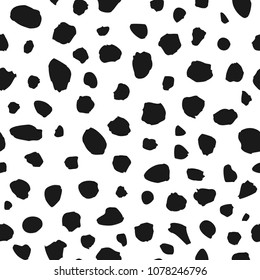 Seamless abstract pattern with black shabby spots on white background. Geometric background.  Vector illustration. Animal pattern. black and white
