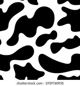 Seamless abstract pattern with black spots. Stylish simple vector texture - white background with black shapeless spots. Background, wallpaper, fabric, textile, for wrapping paper, dalmatian cow print