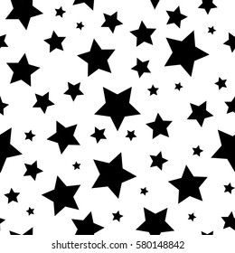 Seamless abstract pattern with black stars of different size on white background. Nice black and white Vector illustration.