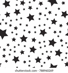 Seamless abstract pattern with black stars of different size on white background. vector