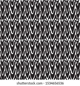 Seamless abstract pattern with black vertical strokes and lines on white background. Modern graphics. Brush stroke. Ethnic stylized background in vector.