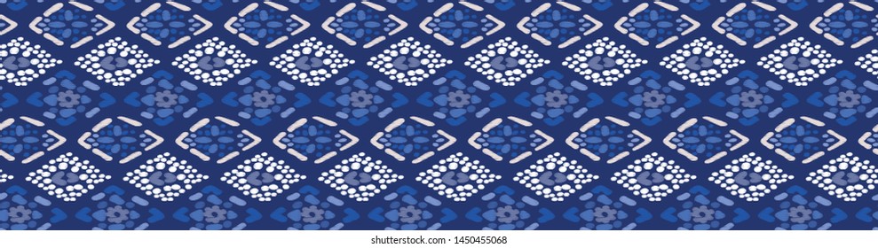 Seamless abstract pattern in blue and white colors. Diamonds embroidery. Folk ornament. Bohemian vintage background.Tribal ethnic vector texture.