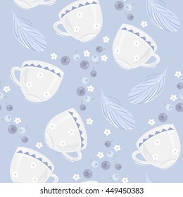 Seamless abstract pattern with blueberries and a cup on a blue background.