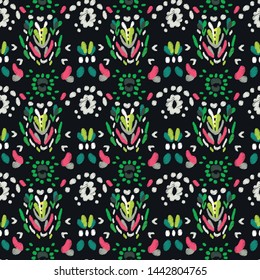 Seamless abstract pattern in bright neon pink and green colors on black background. Folk ornament, vintage embroidery. Tribal ethnic vector texture.