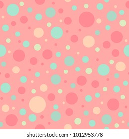 Seamless abstract pattern of circles of different warm bright  colors. Kaleidoscope background. Decorative wallpaper, good for printing. Vector illustration.