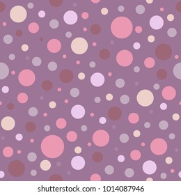 Seamless abstract pattern of circles of different colors on purple backdrop. Kaleidoscope background. Decorative wallpaper, good for printing. Vector illustration.