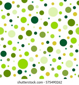 Seamless abstract pattern of circles of different tint and hue of green color.. Kaleidoscope background. Decorative wallpaper, good for printing. Vector illustration.