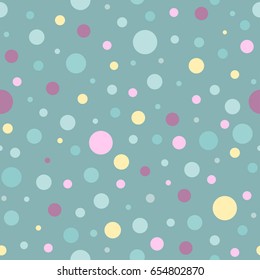 Seamless abstract pattern of circles of different colors and size on turquoise background. Kaleidoscope background. Decorative wallpaper, good for printing. Vector illustration. Yellow and blue