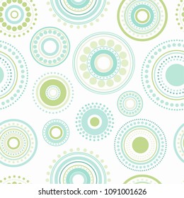 Seamless abstract pattern of circles and dots of green and turquoise colors. Kaleidoscope background. Decorative wallpaper, good for printing. Vector illustration. Ethnic style