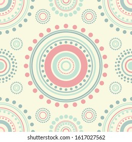 Seamless abstract pattern of circles and dots of pink and turquoise colors on beige background. Kaleidoscope background. Decorative wallpaper, good for printing. Vector illustration. Ethnic style