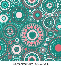 Seamless abstract pattern of circles and dots. Kaleidoscope background. Decorative wallpaper, good for printing. Vector illustration.